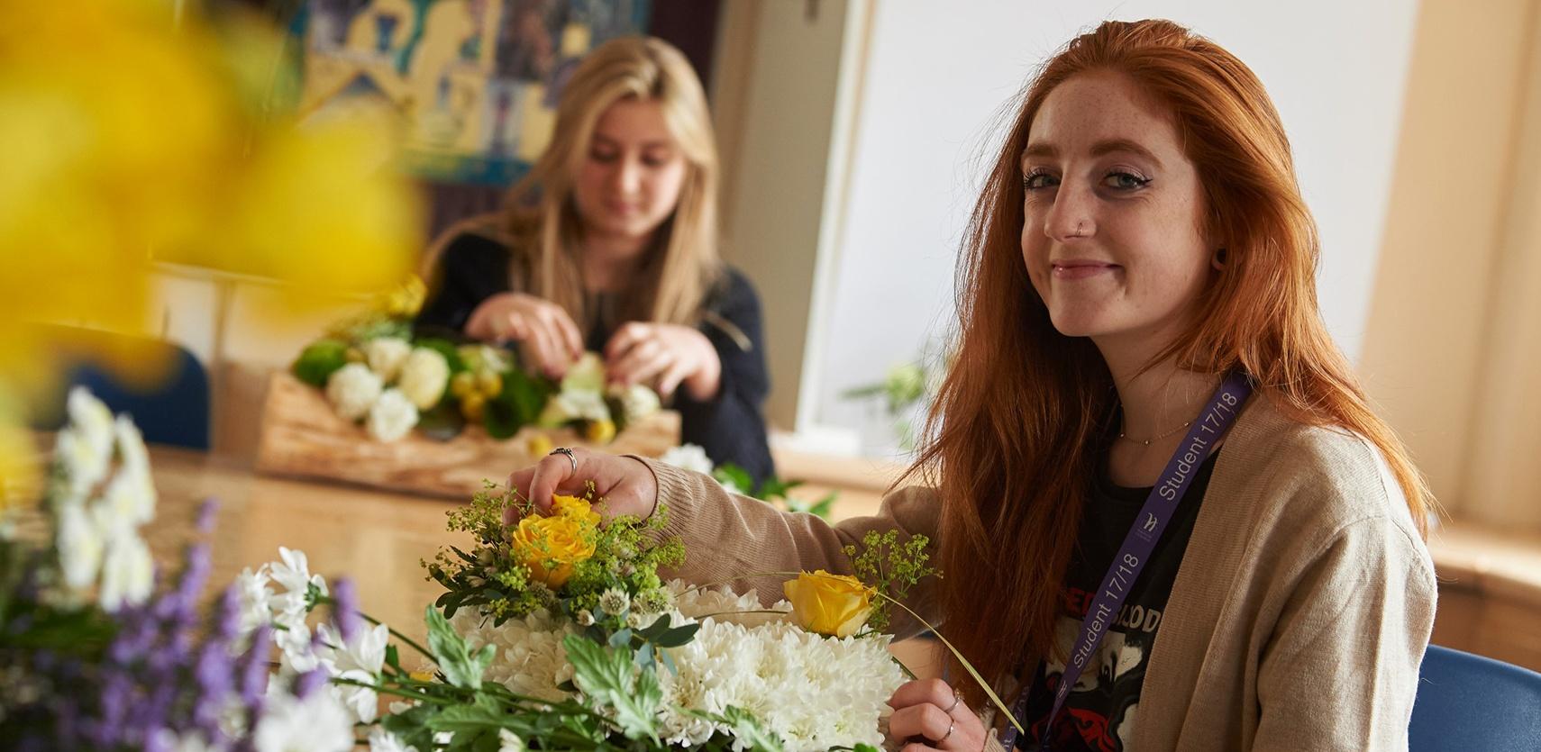 Floristry female student in a workshop
