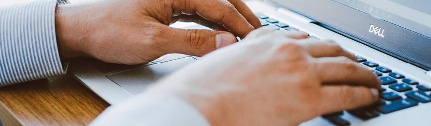 Person using computer keyboard