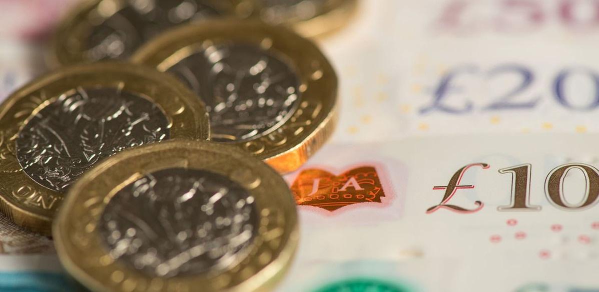 Close up of coins and notes