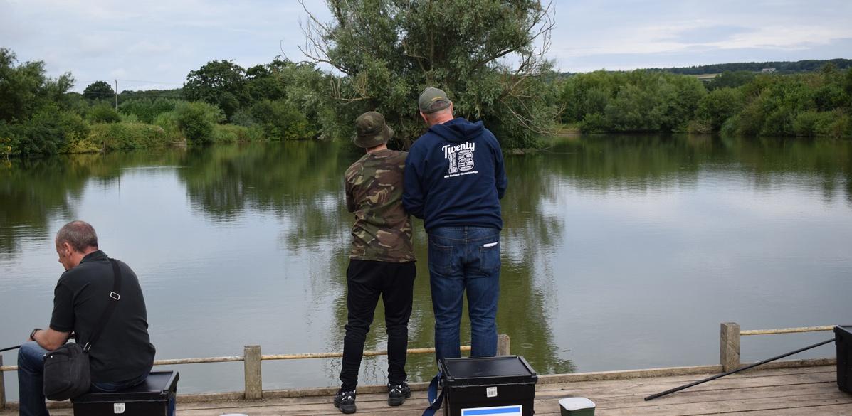 Hadlow people fishing by a lake