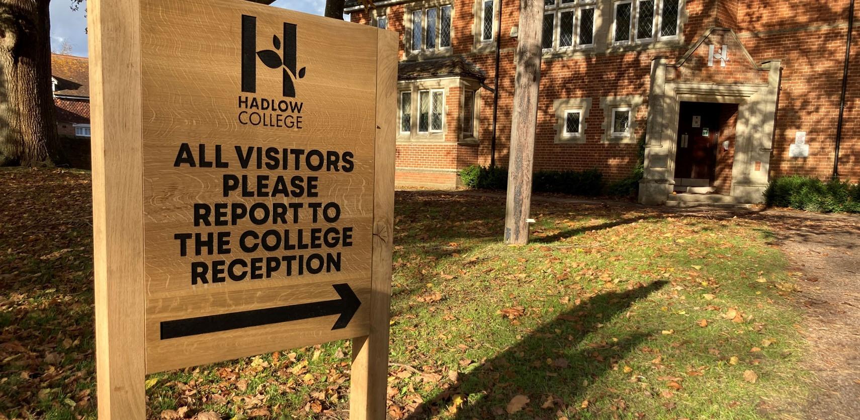 Hadlow College wooden reception sign