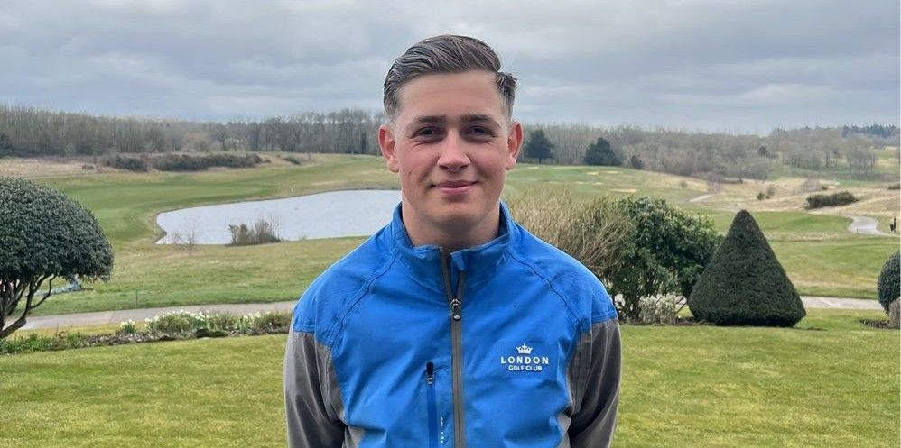 Student with golf course in background