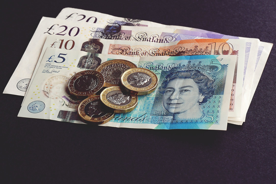 NKC_Finance_Notes_and_Coins_on_table