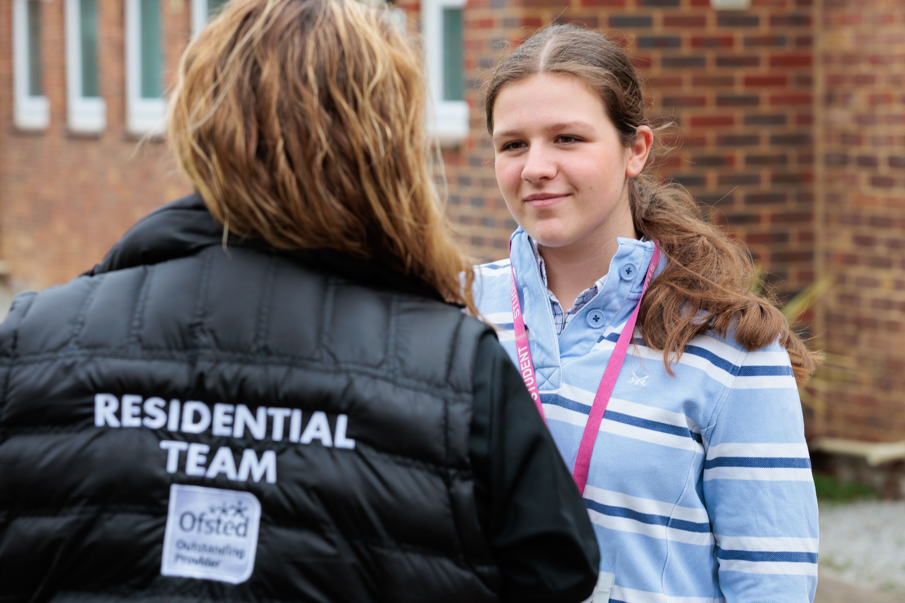 hadlow-college-landscape-residential-hub-student-talking-to-staff