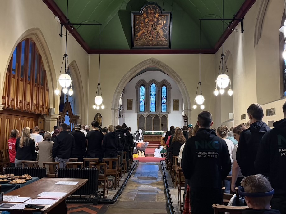 Students and staff attending a Harvest Festival church service at Hadlow